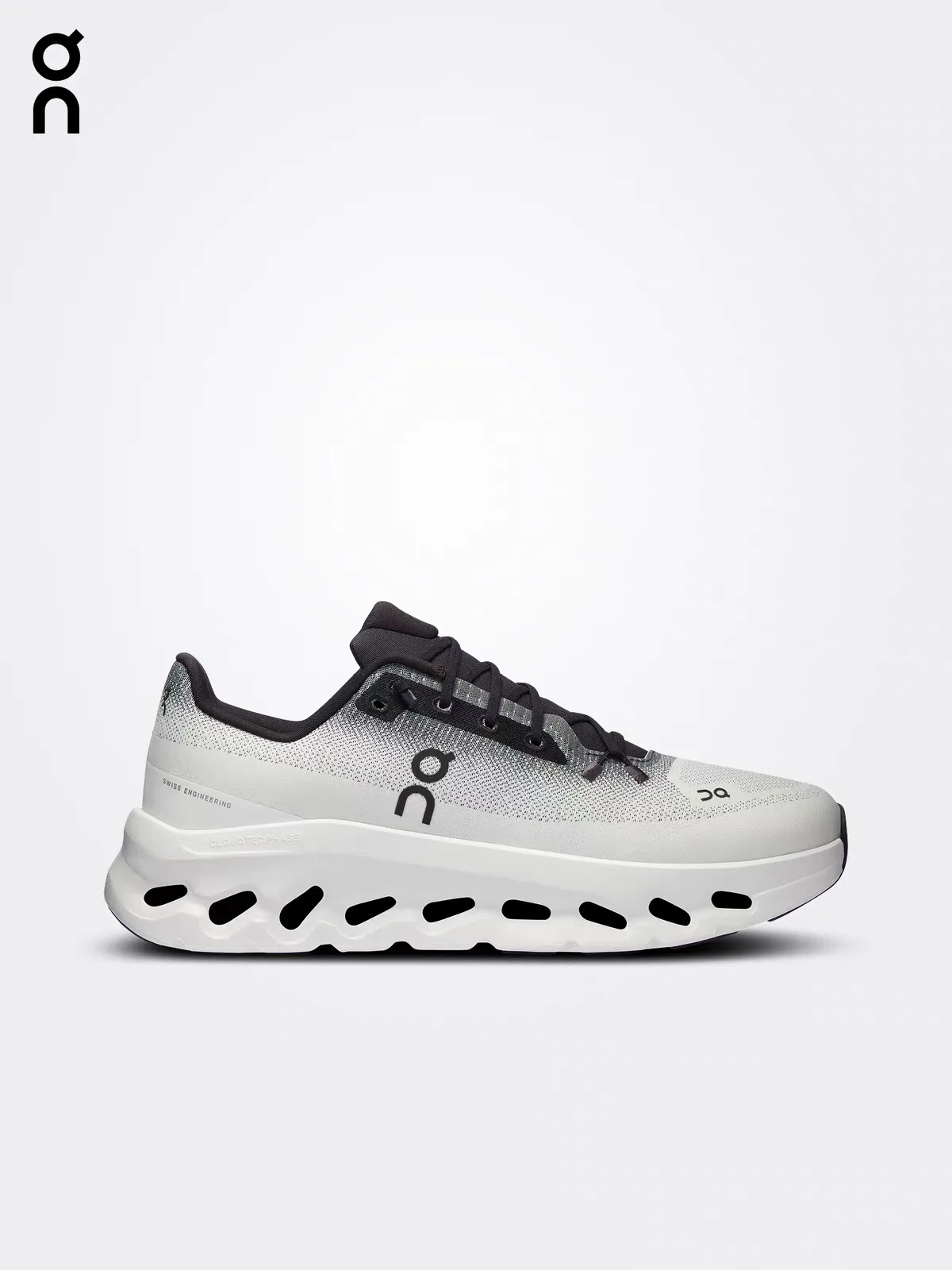 Cloud Swift grey and white knit road running shoe with cushioned sole, side view